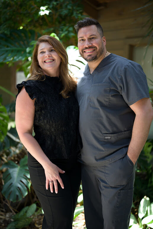 Dr. Barrero and his wife Michele standing together outdoors
