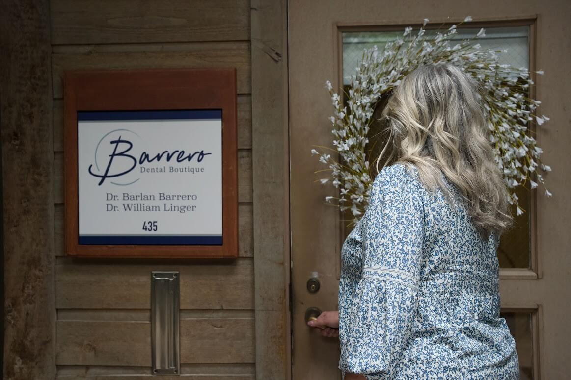 A patient entering Barrero Dental Boutique in Charlotte